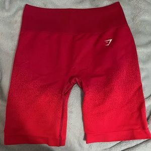 Gymshark shorts, size large, pinkish red color